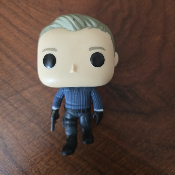 Funko Pop Figures with Black, Gray, and Cream Outfits From James Bond Movies - Picture 5 of 6